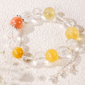 Yellow bead and star crystal bracelet with star charm