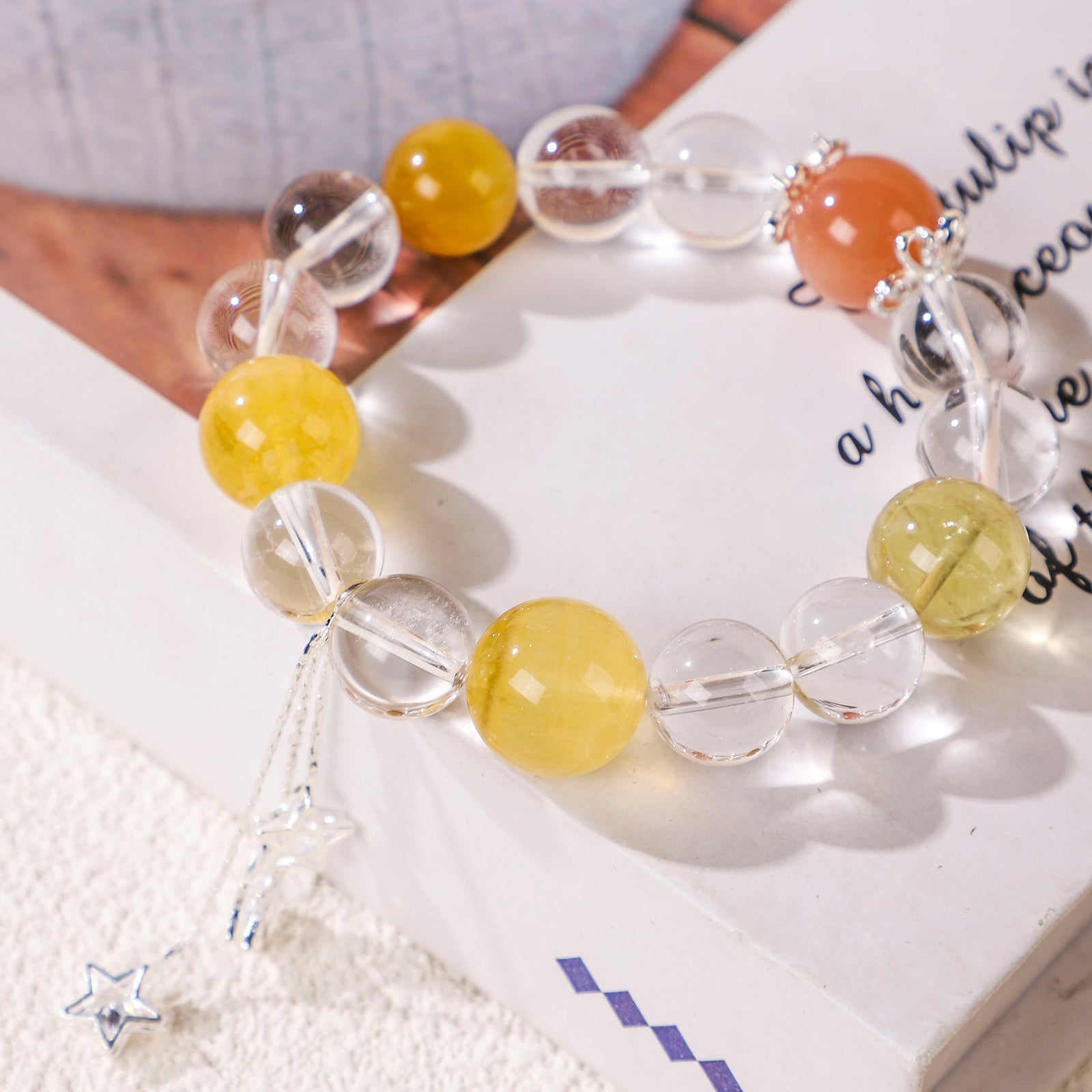 Yellow bead and star crystal bracelet with star charm