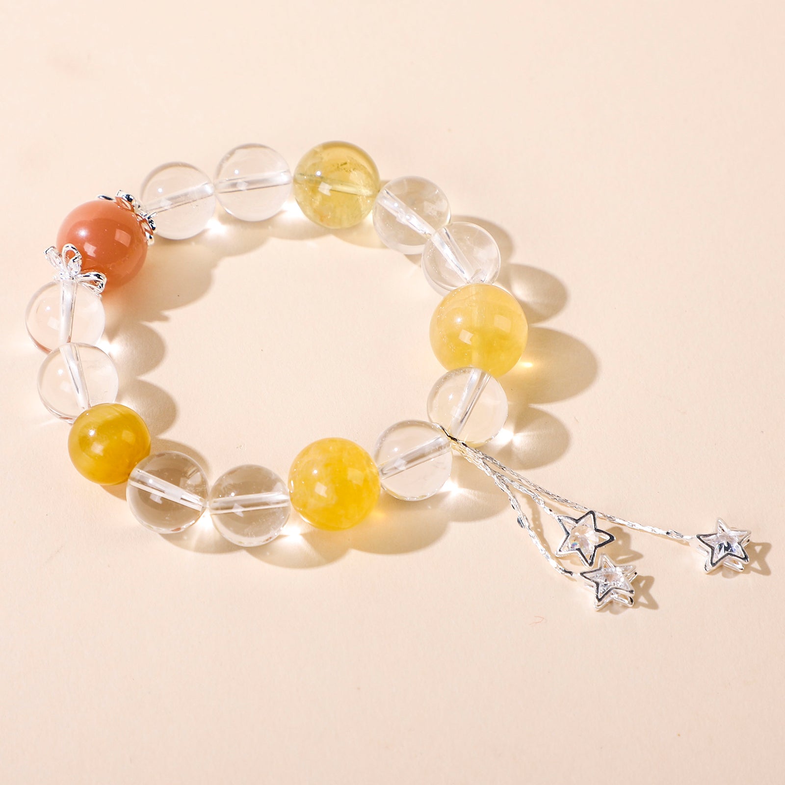 Yellow bead and star crystal bracelet with star charm