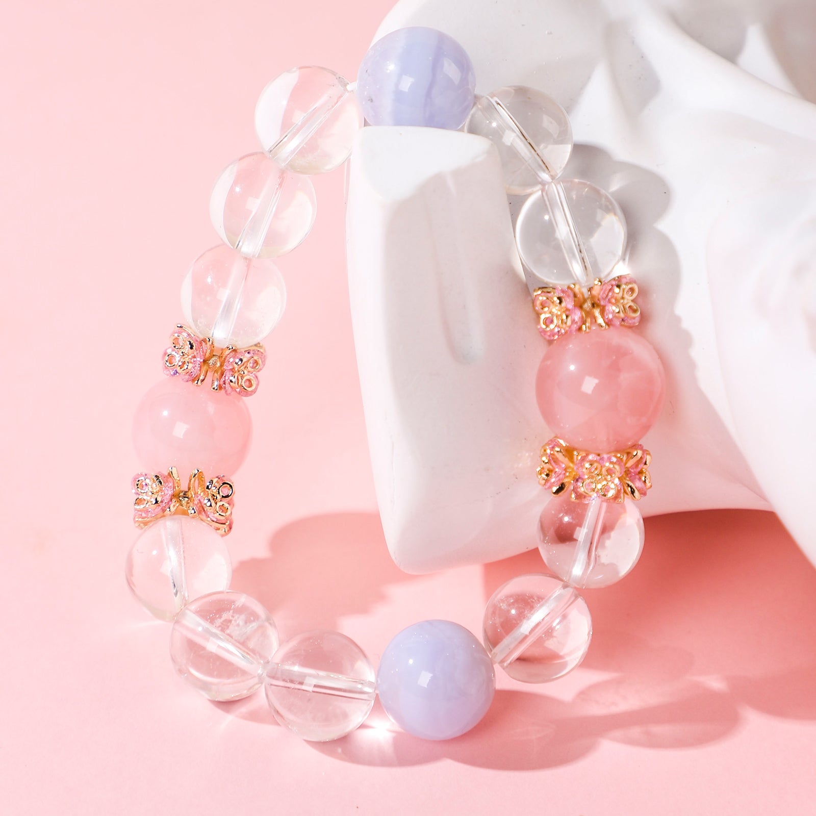 Minimalist bracelet featuring two blue-purple crystals